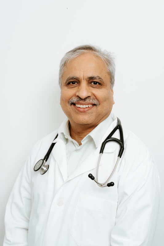 Dr. Parveen Munjal, owner and lead veterinarian at Alta Vista Animal Hospital
